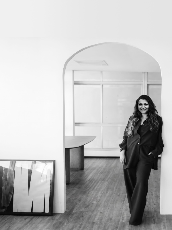 Shaunella Ferns, standing in an archway