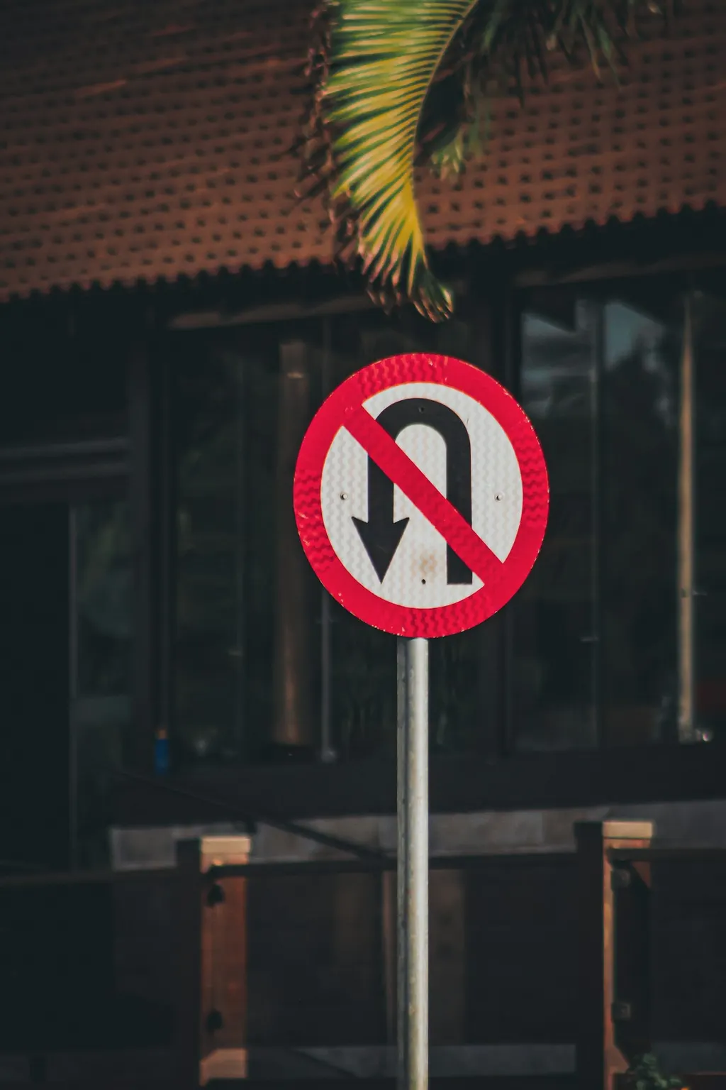 A small sign fixed to a pole.